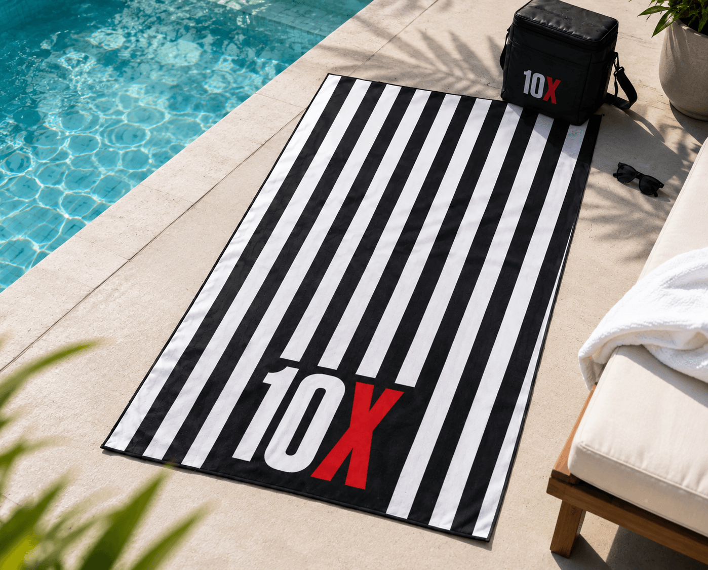 Custom 10X striped beach towel and cooler poolside