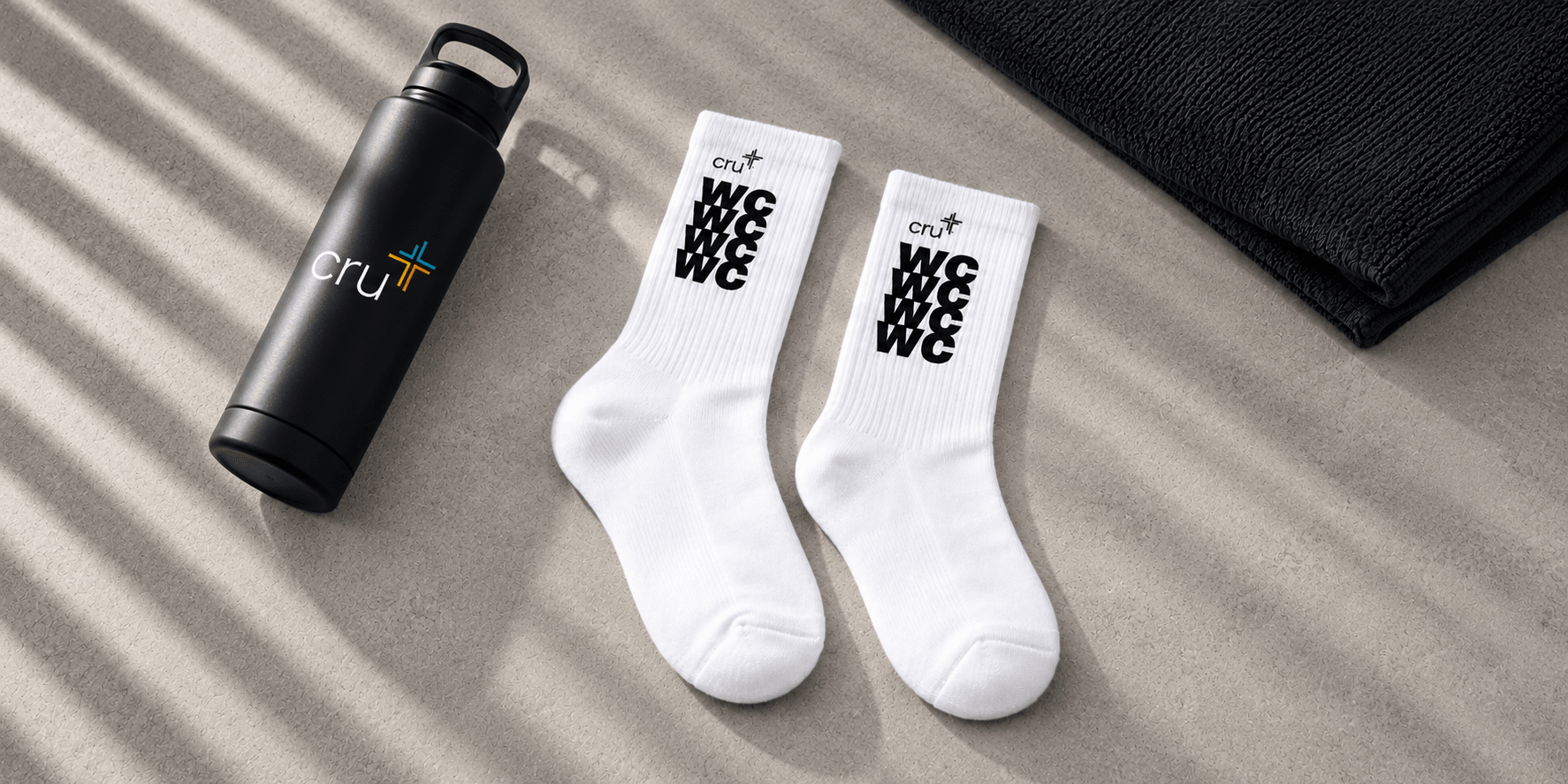 Custom CRU branded conference socks with water bottle